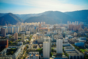 Obraz premium panoramic view from the height of the megalopolis with skyscrapers
