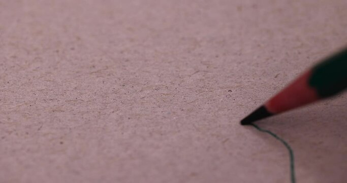 sharp black pencil on paper close-up , school supplies black pencil on paper