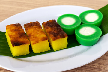 Malaysian dessert kuih Nona Manis and kuih bingka ubi or Baked Tapioca Cassava Cake