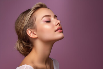 A close up of a woman 's face with her eyes closed