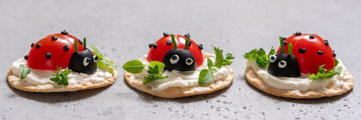 Cracker with cream cheese and tomato for summer party © azurita
