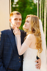 Fototapeta premium The bride and groom at the wedding ceremony venue 