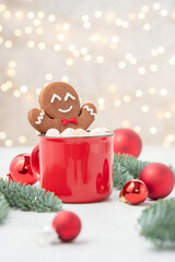 Gingerbread cookie man in a hot chocolate.