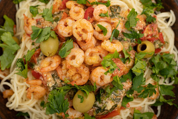 Close-up of pasta with shrimp and vegetables