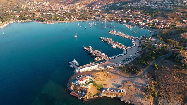 Aerial view of sea marina with boats and yachts in Foca resort town in Turkey on Aegean sea coast