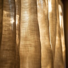 A sunlit gold-toned linen curtain creates a warm, luxurious feel with its rich texture and soft glow