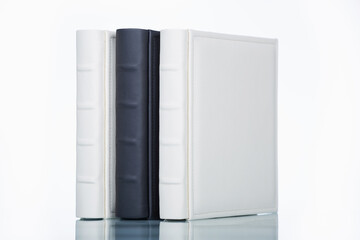 photo books with cover of genuine leather. Wedding photobooks in white and black leather binding....