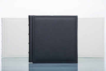 photo books with cover of genuine leather. Wedding photobooks in white and black leather binding....