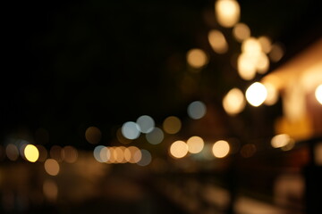Fototapeta premium Black background Horizontal background with blur bokeh effects for christmas time. Special occasion concept with space for text.