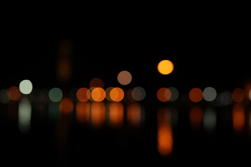Fototapeta premium Christmas gold background. Golden holiday glowing backdrop. Defocused Background With Blinking Stars. Blurred Bokeh curtain