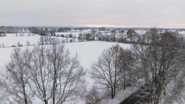 Aerial view of a snowy rural scene in northern germany