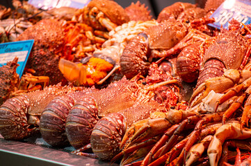 Enjoining diversity of fresh seafood, meat, vegetables and fruits on Atarazanas Central Market in Malaga, Spain