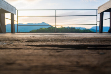 empty wooden floor with blurred natural sunset background with copy space for product editing or image layout key design.