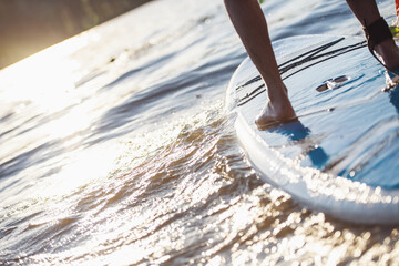 Man standup paddleboarding