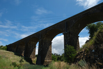 The Malmsbury Viaduct is a large brick and stone masonry arch bridge over the Coliban River at Malmsbury on the Bendigo Railway in Victoria Australia.