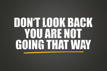 Don't look back you are not going that way. A blackboard with white text. Illustration with grunge text style.