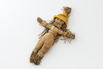 Vintage straw doll.The old way of weaving toys from reeds. An ancient children's toy.
