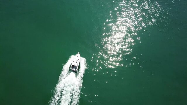 Ocean cruise, travel boat and drone aerial view of trip, outdoor ride or sailing for nature freedom, yachting or transportation. Holiday background, sea waves and speedboat journey on yacht adventure
