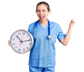 Young beautiful blonde woman wearing doctor uniform and stethoscope screaming proud, celebrating victory and success very excited with raised arms