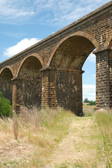 The Malmsbury Viaduct is a large brick and stone masonry arch bridge over the Coliban River at Malmsbury on the Bendigo Railway in Victoria Australia.