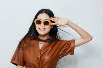 Beautiful woman beauty portrait lifestyle beige asian vacations fashion sunglasses glamour hair model