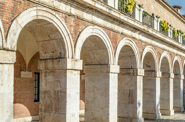 Architectural detail, columns and arches in Aranjuez, Spain