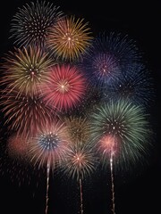 Fototapeta premium Beautiful multicolored fireworks on a black background
