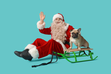 Santa Claus with sled and cute French bulldog waving hand on blue background