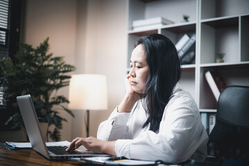 A woman battles depression and stress in her workplace, highlighting the challenges faced by professionals. This image captures the impact of mental health on employees in a corporate environment.