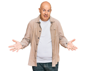 Middle age bald man wearing casual clothes clueless and confused expression with arms and hands raised. doubt concept.