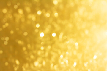 Christmas golden background with glittering snowflakes