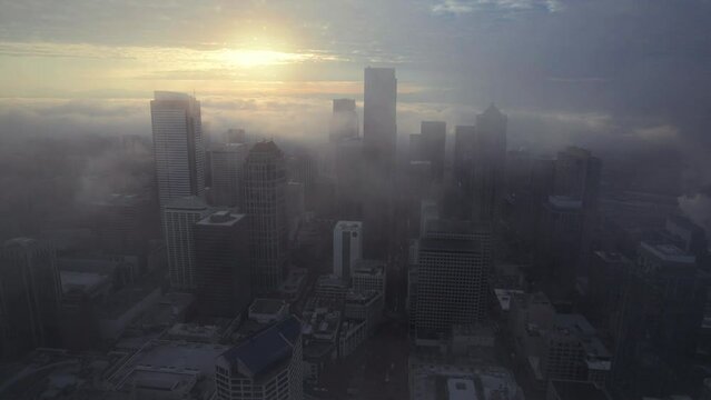 Drone Flight Fog Reveal of Dramatic Seattle Cityscape