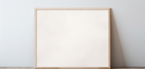 Wooden frame showcasing an empty canvas against a subtle gradient backdrop. Empty mockup with contemporary flair.