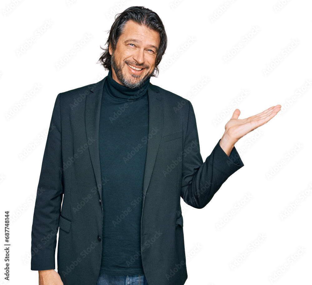 Canvas Prints Middle age handsome man wearing business clothes smiling cheerful presenting and pointing with palm of hand looking at the camera.