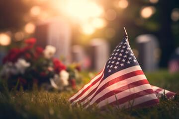 The American flag placed on the grave of a fallen soldier, a poignant tribute to their sacrifice. Memorial Day, remembering the fallen soldiers around the world.
 - obrazy, fototapety, plakaty