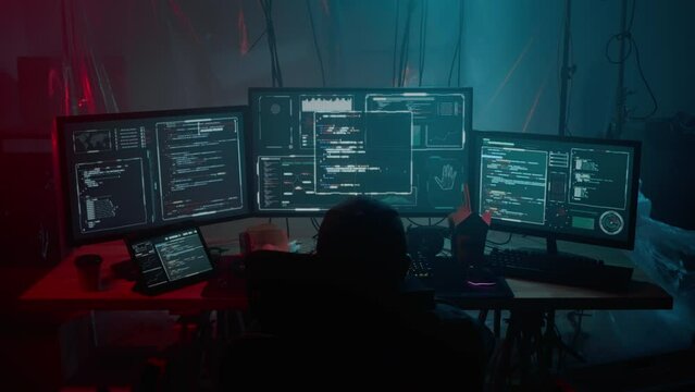 Male hacker coding virus ransomware using technology