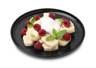 Plate of tasty lazy dumplings with raspberries, sour cream and mint leaves isolated on white