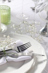 Beautiful table setting with floral decor, closeup