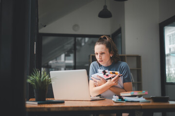 Business woman using business paper for doing math finance on office desk, tax, report, accounting, statistics, and analytical research concept