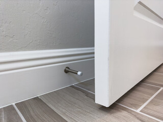 A standard doorstop in a new American house