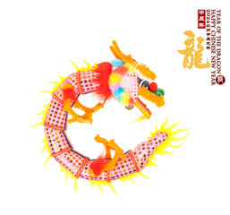 chinese new year concept with hand made dragon isolated on white background,rightside word and seal mean:Chinese calendar for the year,downside seal mean:good bless