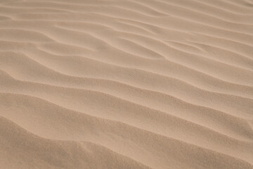 The background image of the sand texture created by the wind, erosion