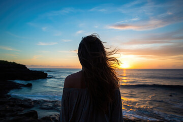 Fototapeta premium photo of a person / people on the beach in the style of Intrepid traveler, traveling on a shoestring, tramping, hiking and tracking - Wandering lonely but content soul on a wild beach - 