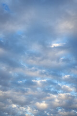 Naklejka na ściany i meble Blue sky with white fluffy cumulus clouds