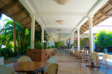 Resort hotel in the Dominical Republic, Punta Cana, with white round pillars - obrazy, fototapety, plakaty