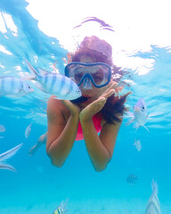 Naklejka premium snorkeling trip at Samaesan Thailand dive underwater with fishes in the coral reef sea pool
