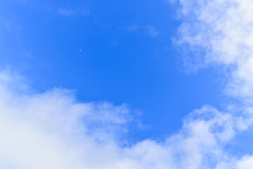beautiful blue sky with white cloud, natural background in springtime
