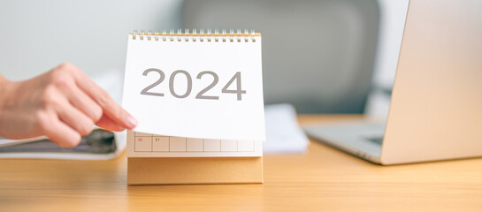 2024 Year Calendar on table background. countdown, Happy New Year, Resolution, Goals, Plan, ...
