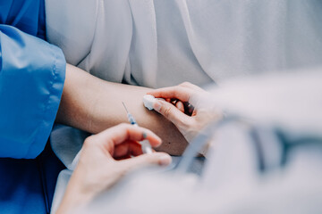 Doctor telling to patient woman the results of her medical tests. Doctor showing medical records to...