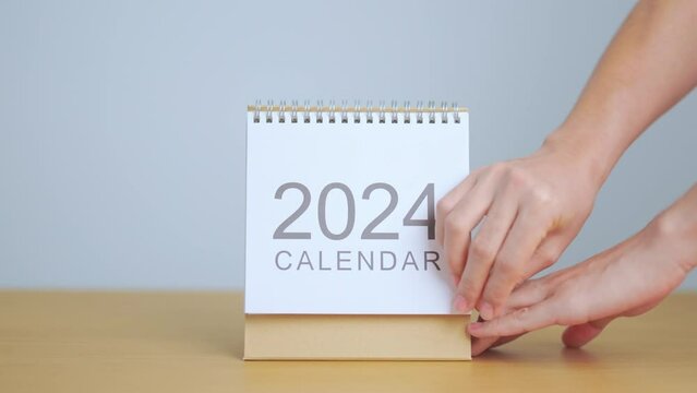 2024 Year Calendar on table background. Happy New Year, Resolution, Goals, Plan,  Action, Mission and financial Concept